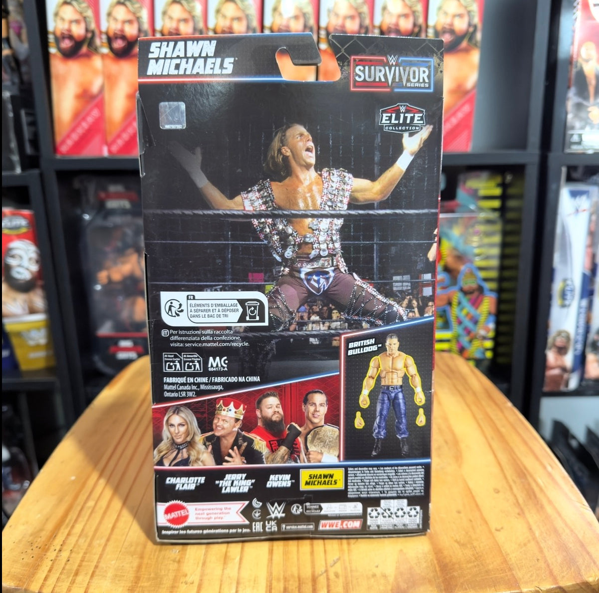 Boxed WWE Elite Collection action figure in black packaging with full-body figure art