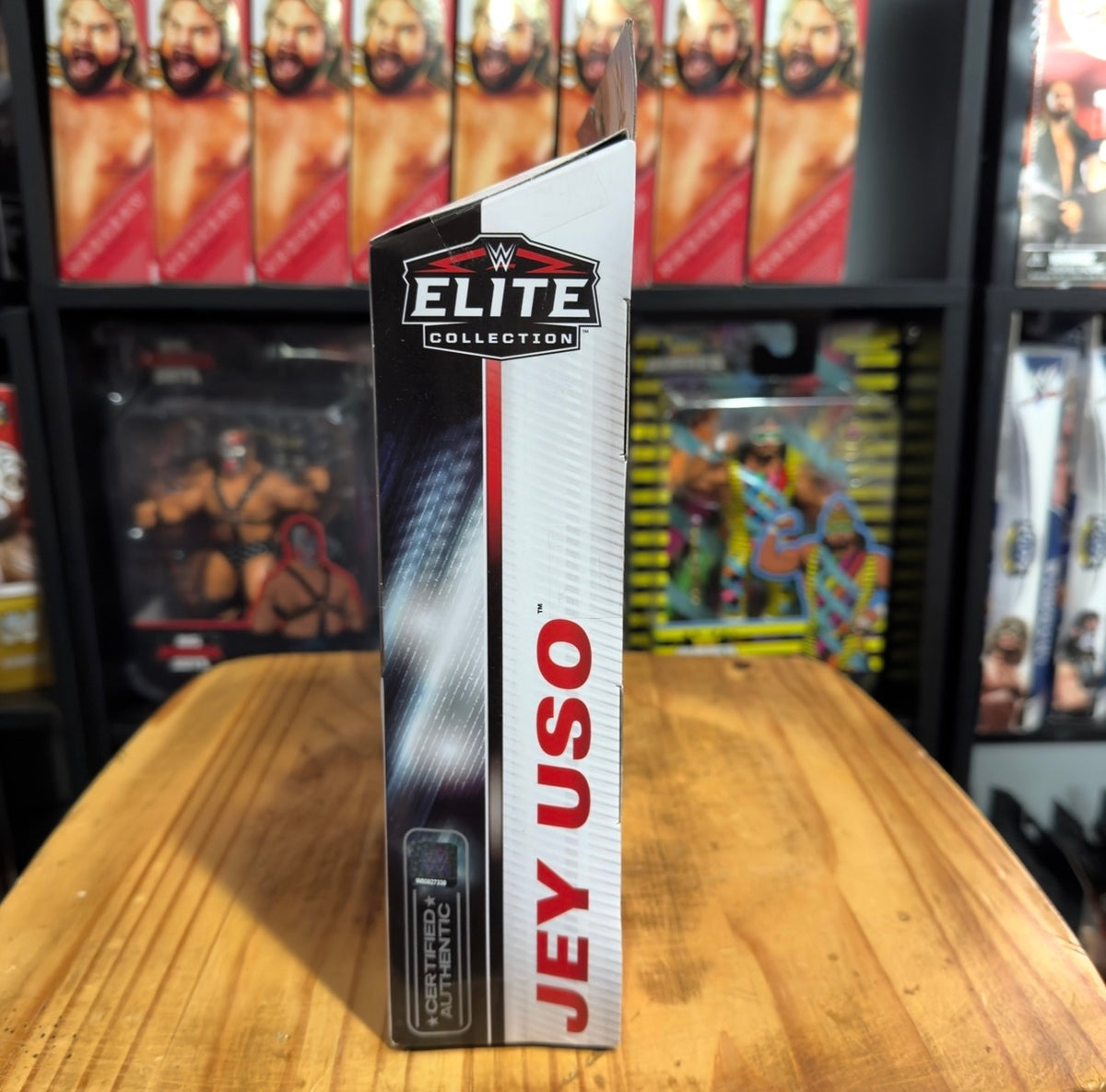 WWE Elite Jey Uso action figure box with 'ELITE COLLECTION' panel and red vertical text