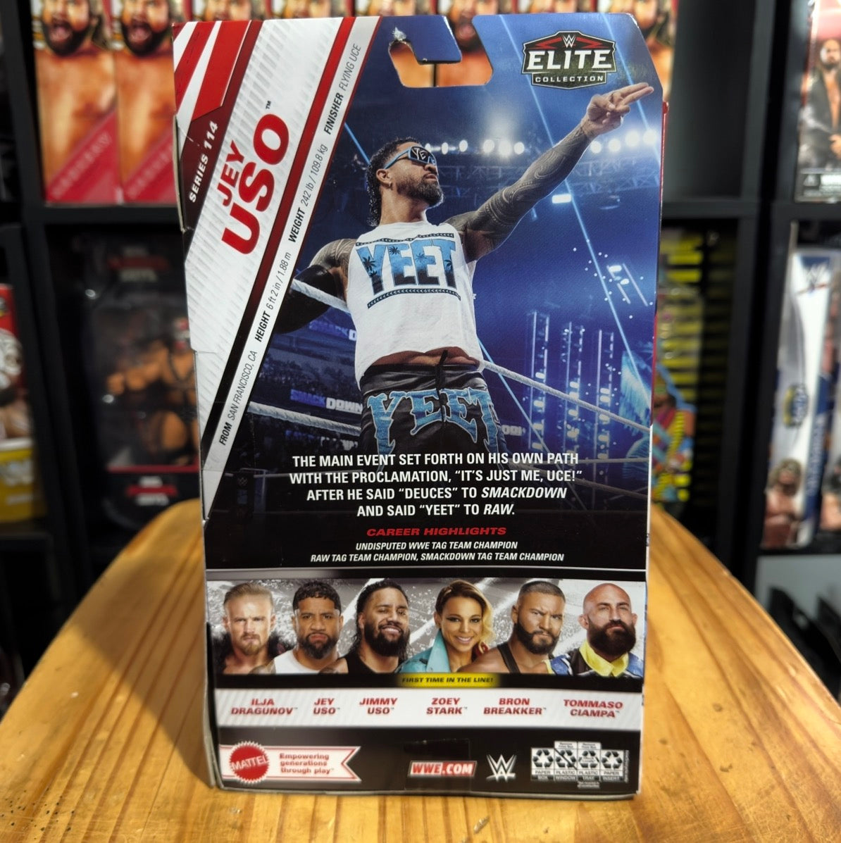WWE Elite Jey Uso action figure box front with wrestler artwork and roster strip