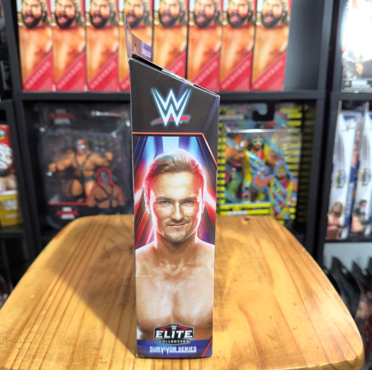 WWE Elite action figure box with Drew McIntyre portrait and Survivor Series logo