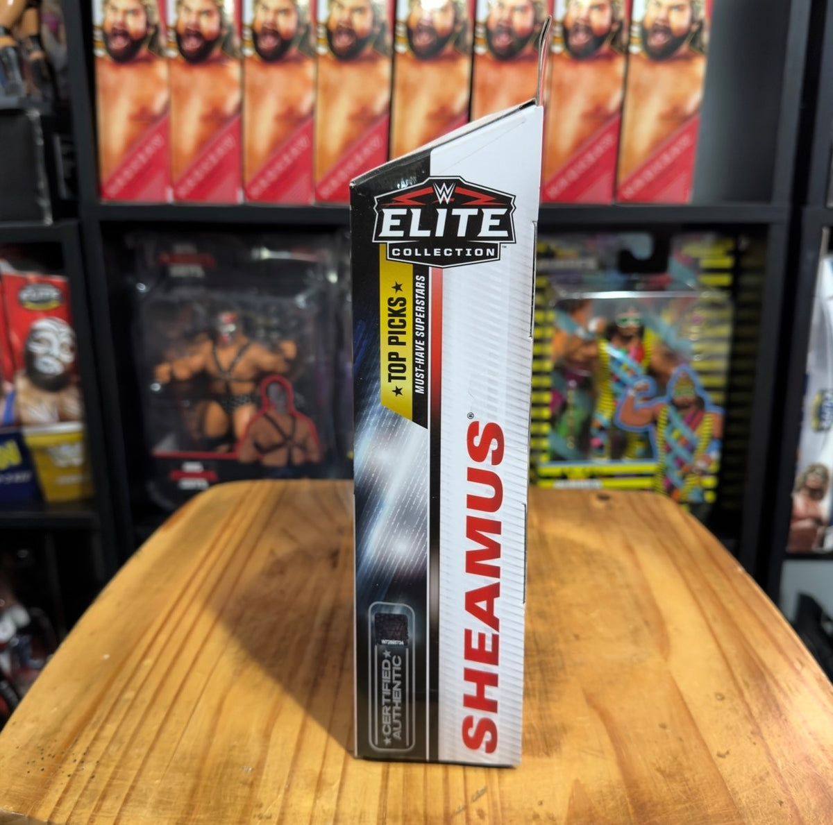 WWE Elite action figure box side with Sheamus vertical label and Elite logo