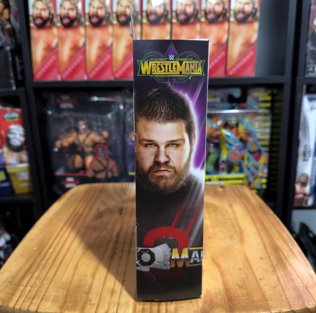WWE Elite Collection action figure box with Kevin Owens portrait artwork, tall view