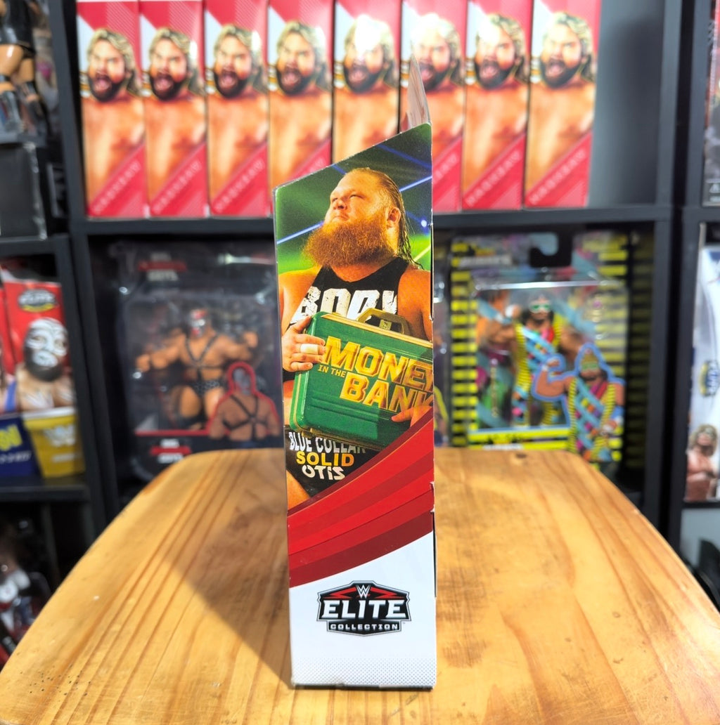 WWE Elite Collection action figure box side with Otis money-in-the-bank artwork