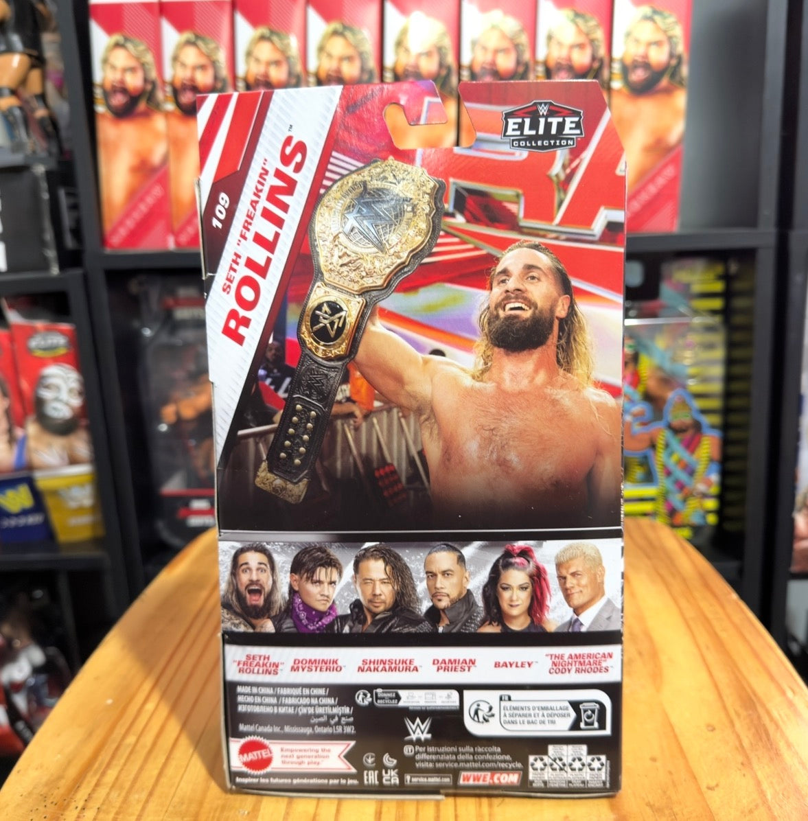 WWE Elite Collection action figure box back with Seth Rollins holding championship belt
