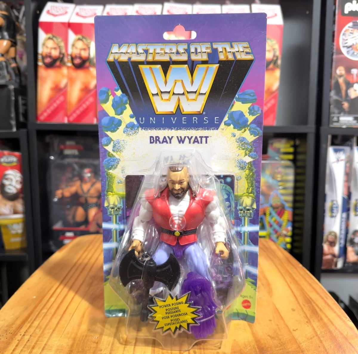 Bray Wyatt action figure retail blister box with purple accents and red vest