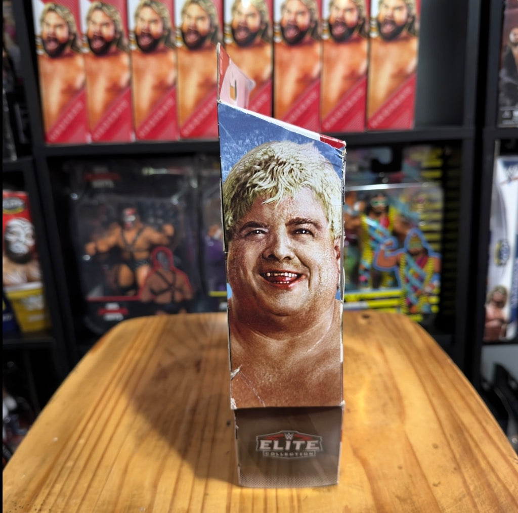 Dusty Rhodes Elite Collection packaging with smiling face insert, upright on box