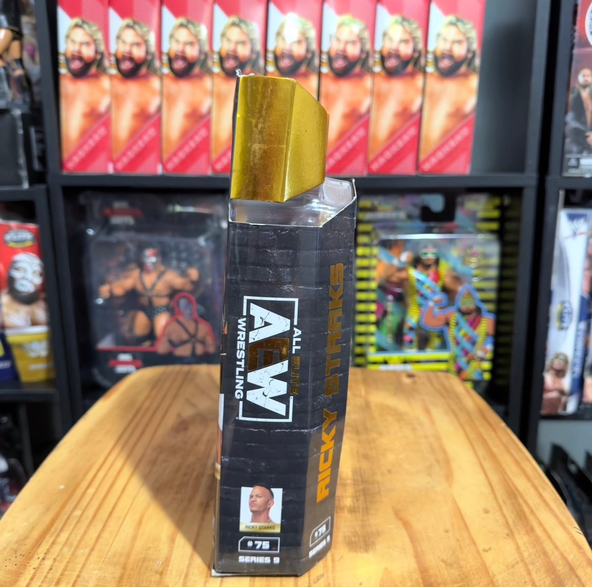 AEW Wrestling action figure blister box with black side panel and gold top