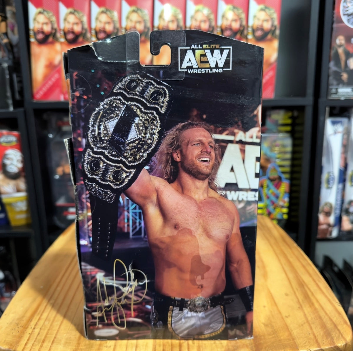 AEW wrestling action figure in box with Hangman Adam Page artwork on front