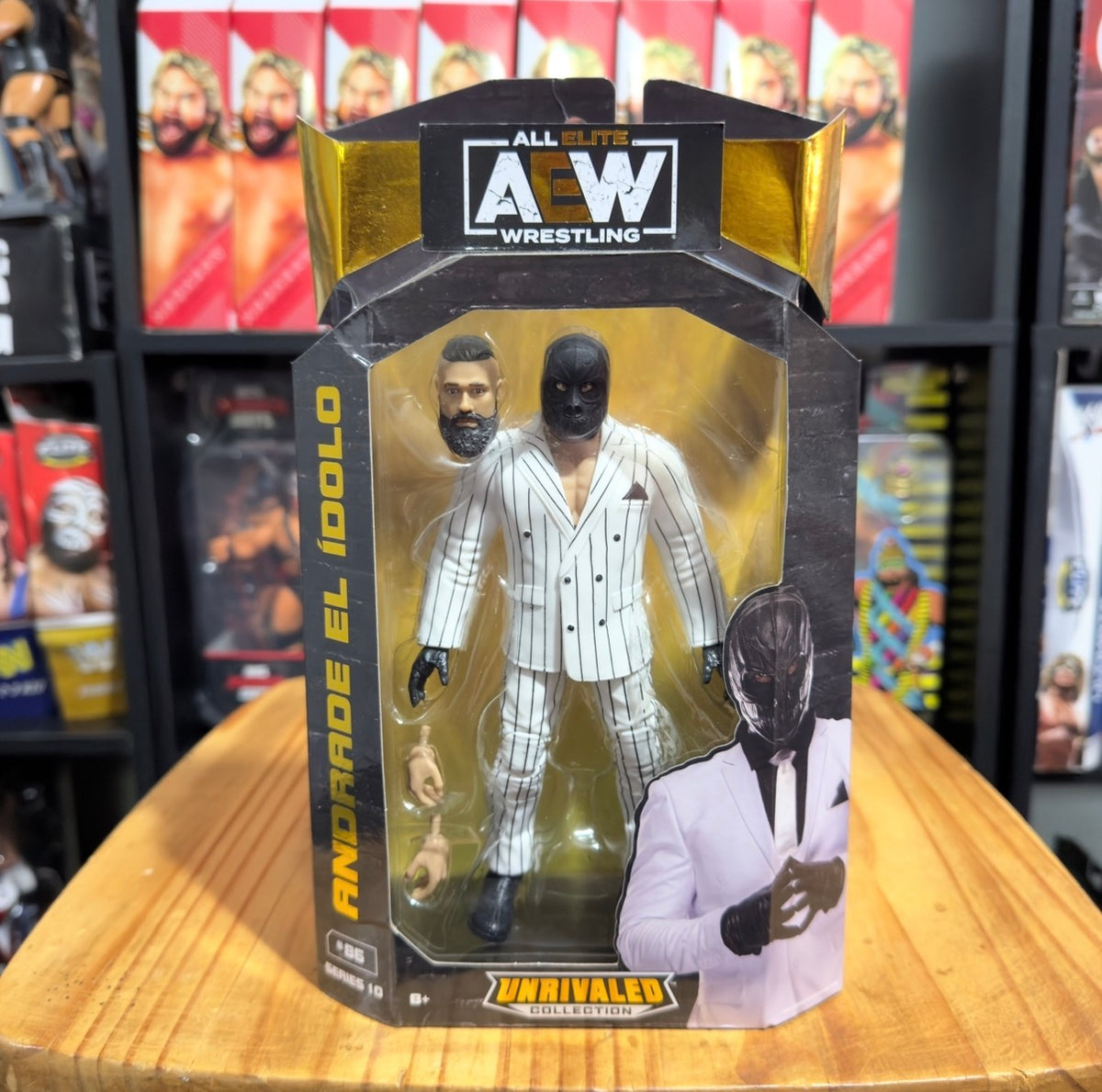 AEW Unrivaled wrestling action figure box, white pinstripe suit and masked character