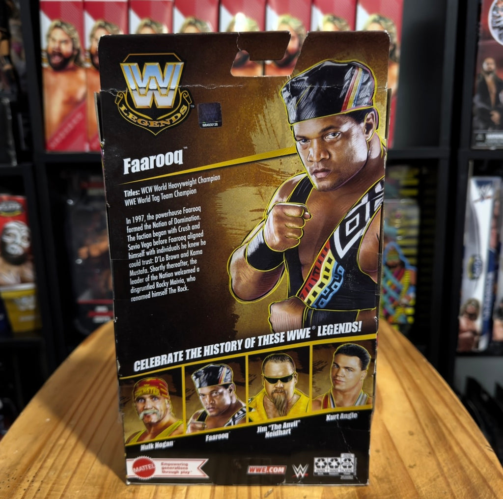 WWE Elite Series 24 Faarooq action figure in box, back panel with character art