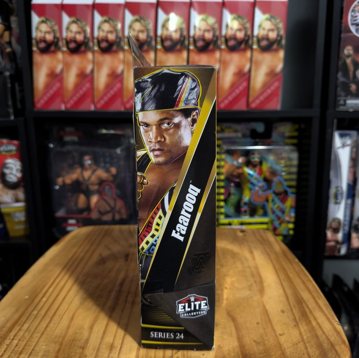 WWE Elite Series 24 Faarooq action figure in box, side portrait view