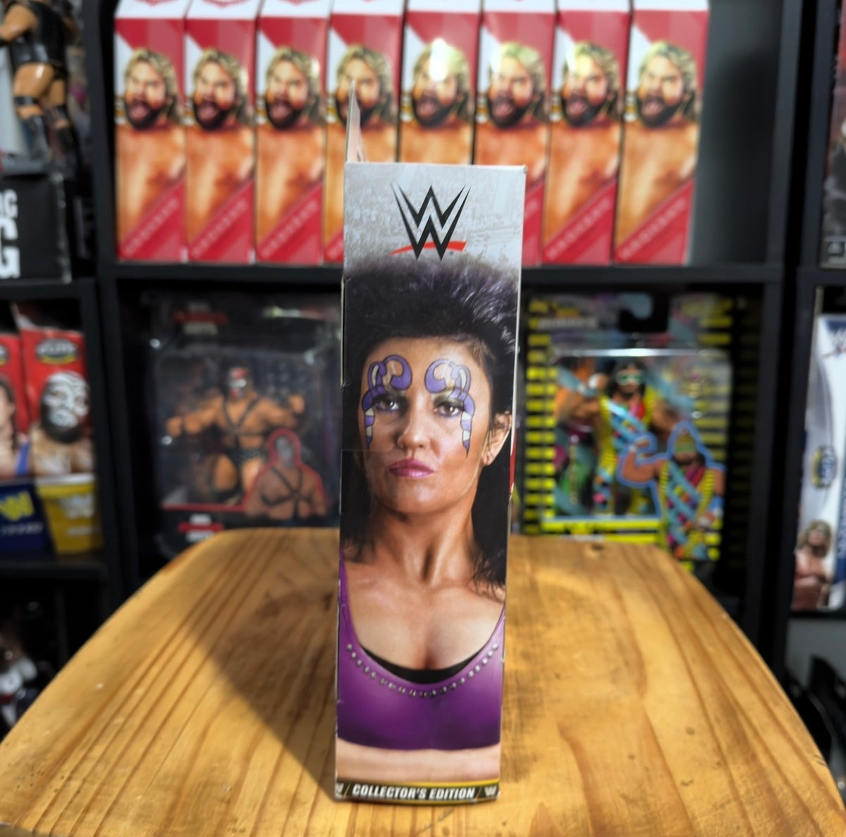 WWE Elite action figure box front with Sherri portrait in purple outfit