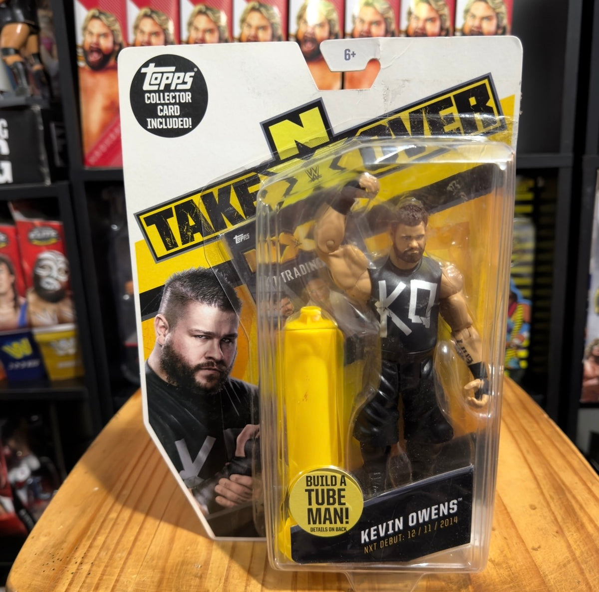Kevin Owens NXT TakeOver action figure in clear blister on yellow backing card