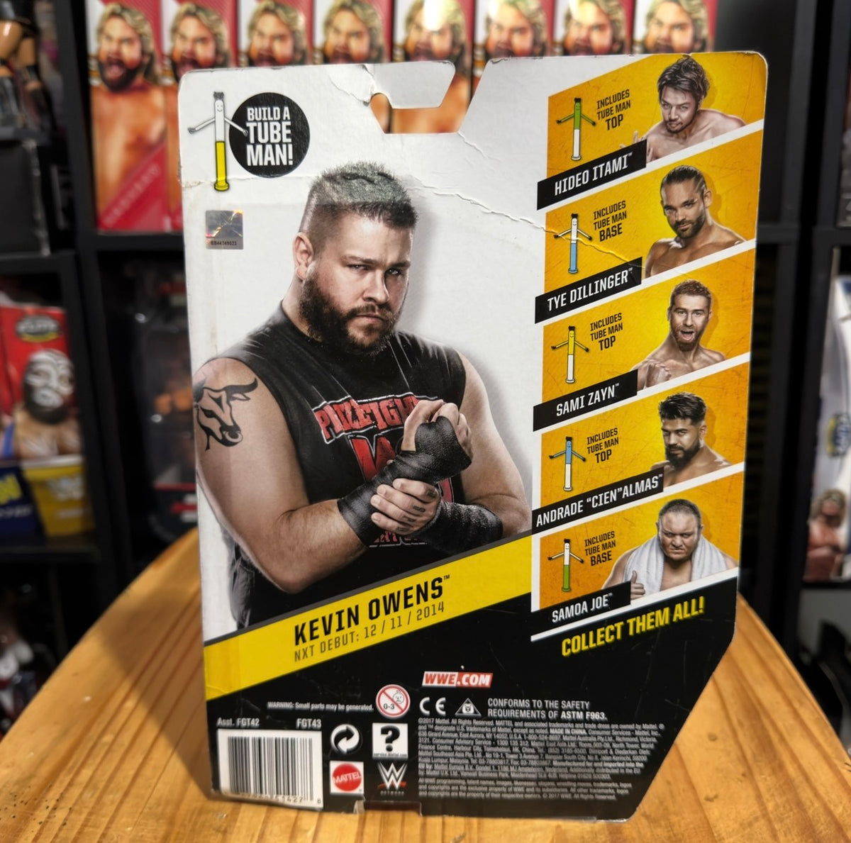 Kevin Owens NXT TakeOver action figure box back with character photos and product details