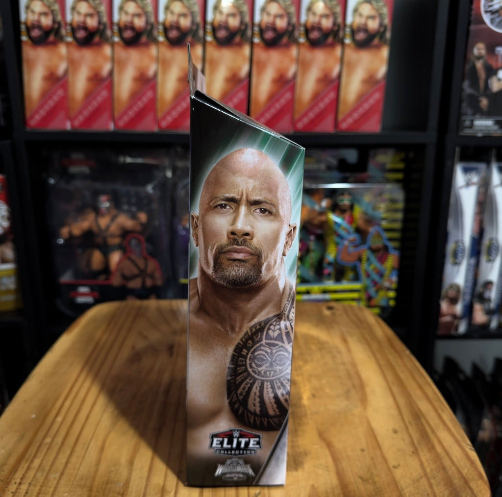 WWE Elite Collection The Rock action figure box with head-and-shoulders portrait