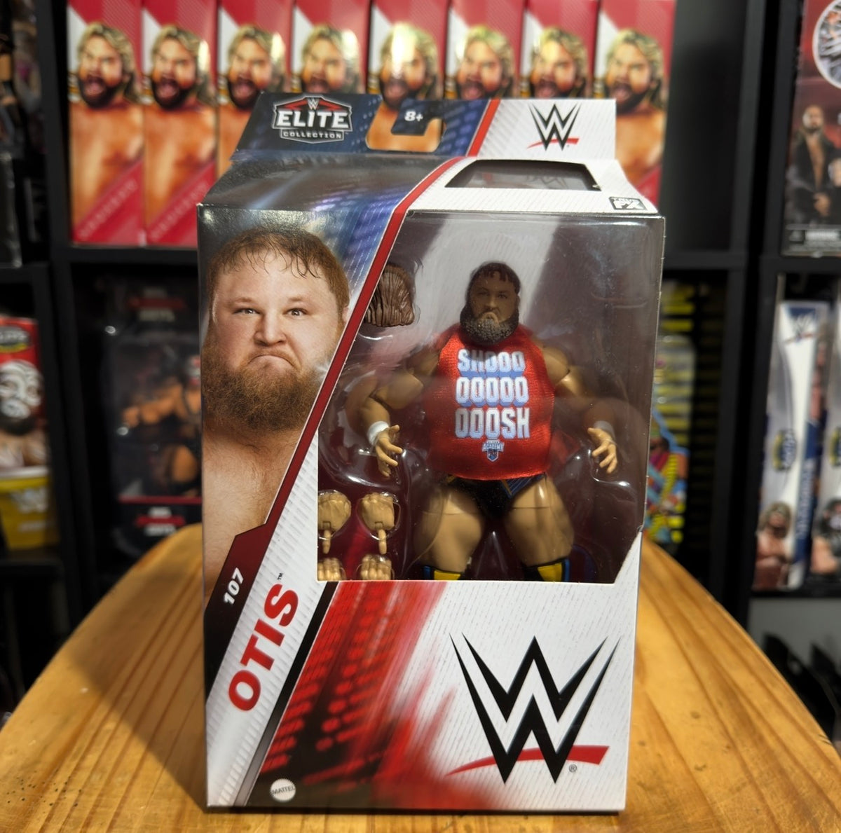 Otis Elite action figure in window box, front view with WWE logo and red graphics