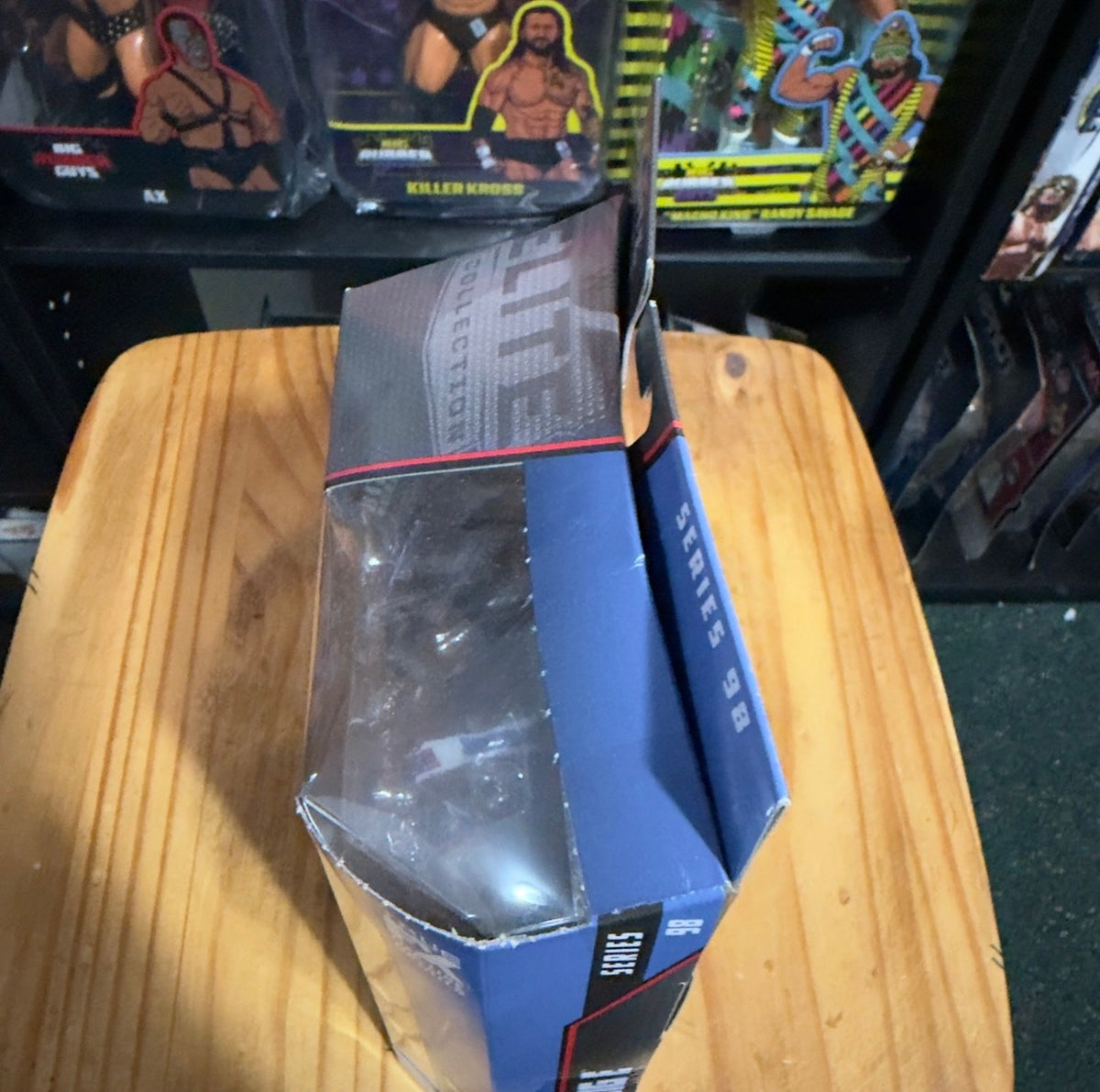 WWE Big E Elite Series 98 box side with blue graphics and plastic window