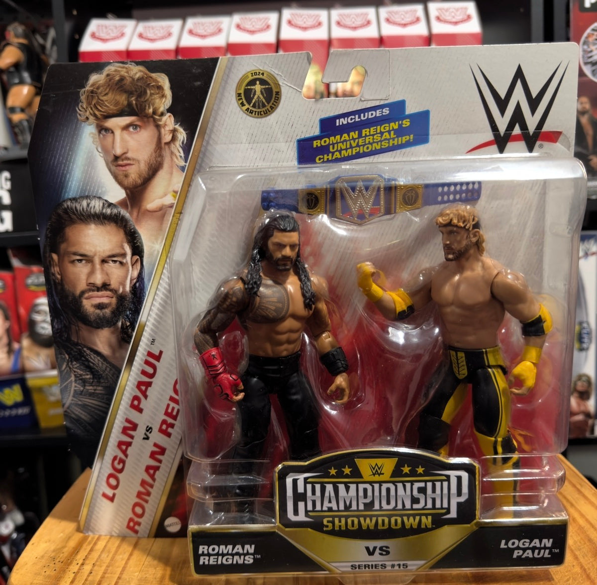 Boxed Roman Reigns and Logan Paul WWE Championship Showdown action figures in blister pack