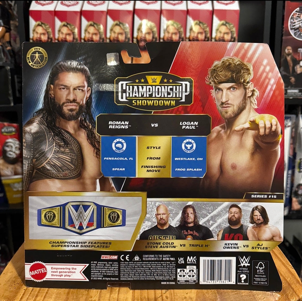WWE Championship Showdown Series 15 boxed action figure set with Roman Reigns and Logan Paul