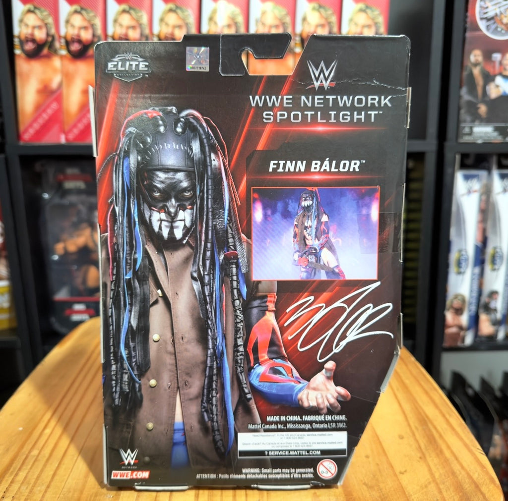 WWE Network Spotlight Finn Balor Elite boxed action figure with artwork and autograph