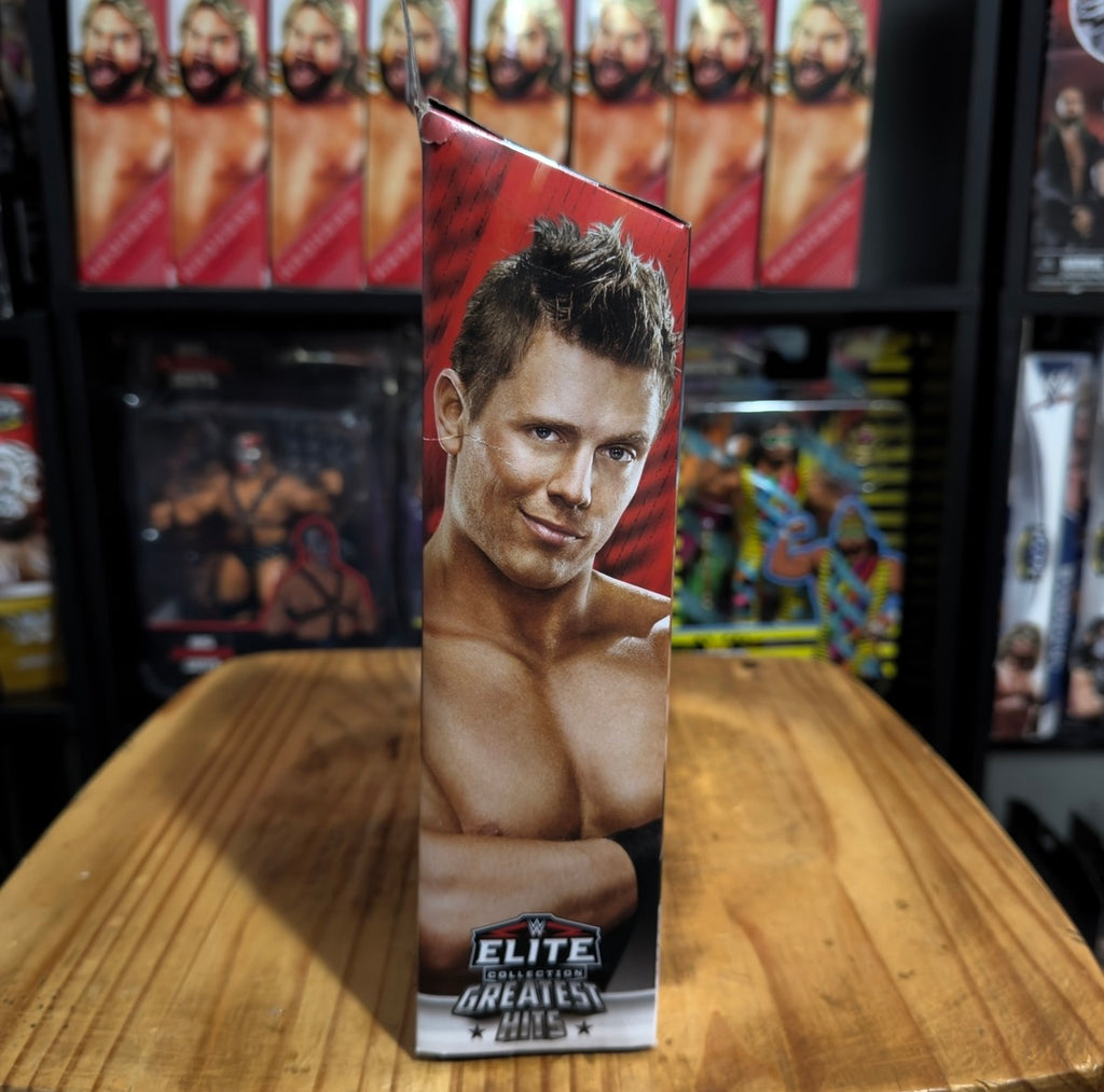 WWE Elite The Miz action figure box, face portrait and “Greatest Hits” logo.