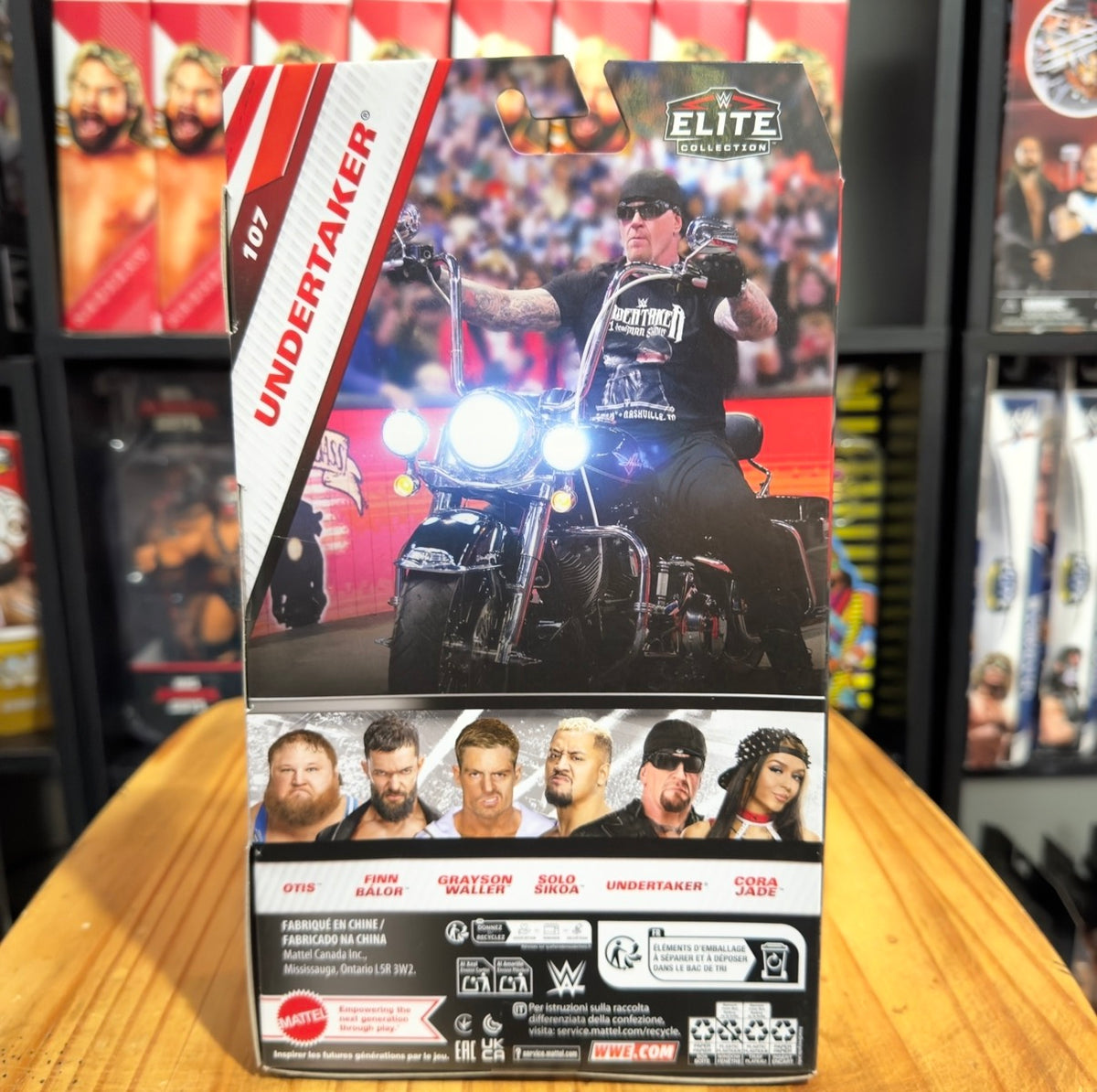 Undertaker WWE Elite action figure box back with product lineup images