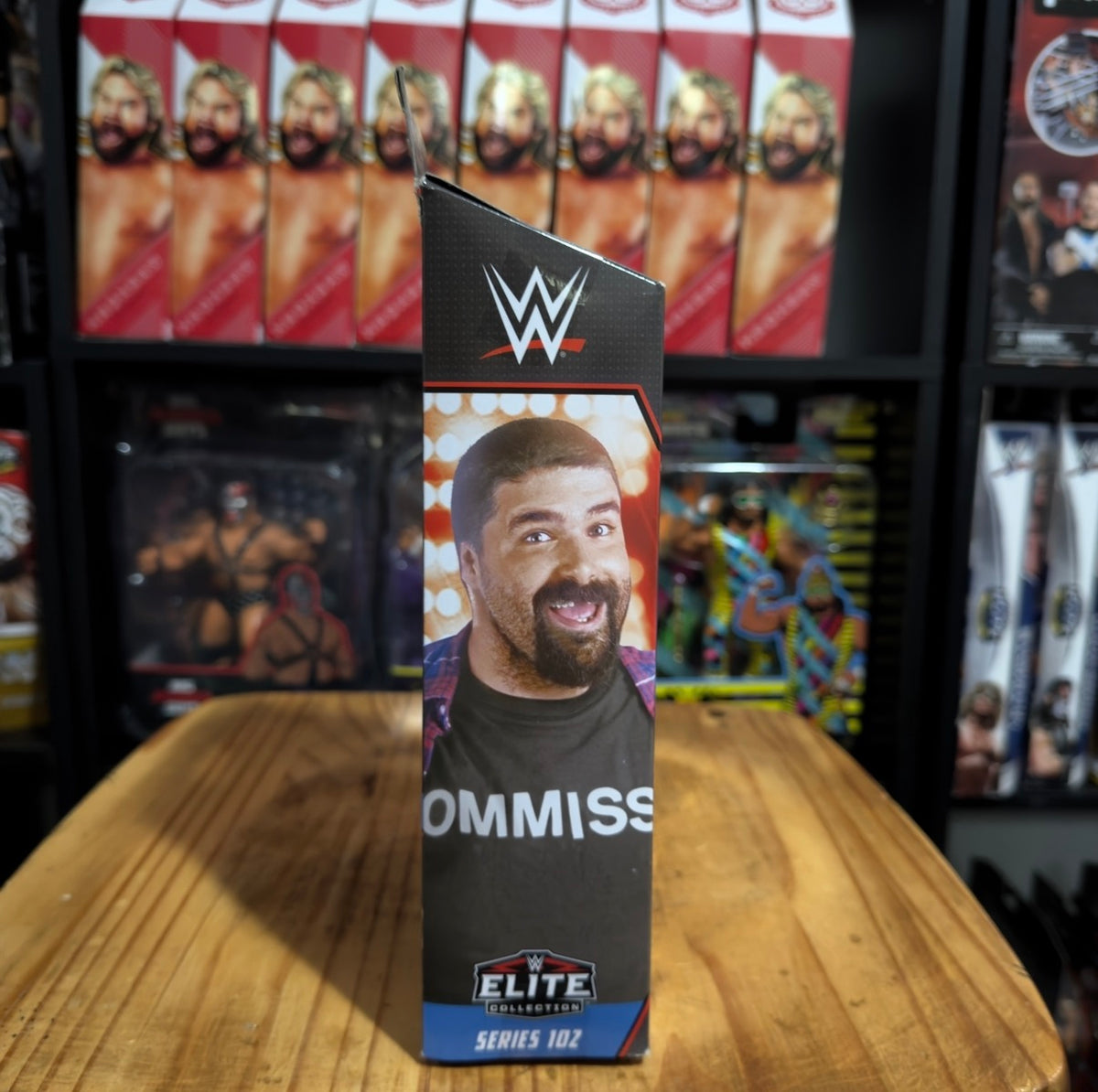 WWE Elite action figure box with Commissioner Foley character portrait, Series 102