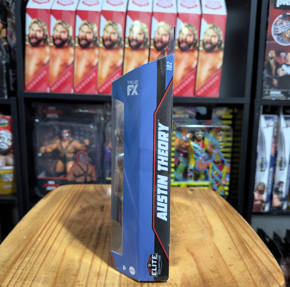 Austin Theory Elite Series 102 action figure box side panel with vertical branding