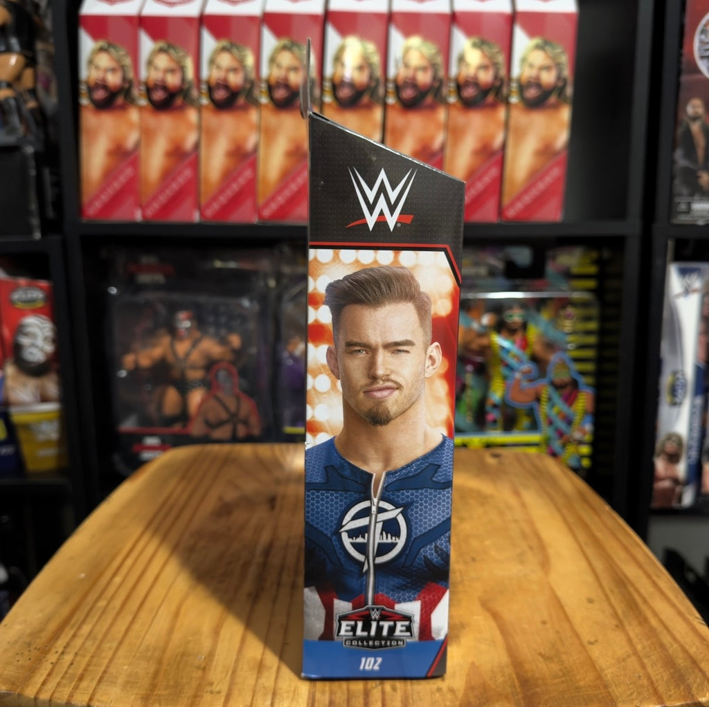 Austin Theory Elite Series 102 action figure box, blue-and-red design with portrait