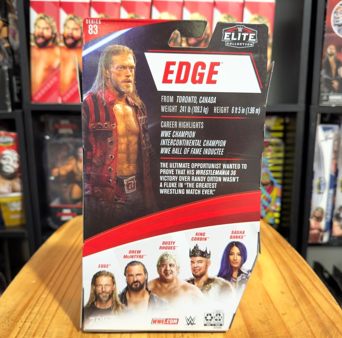 WWE Elite action figure box back with wrestler bio text and red graphics