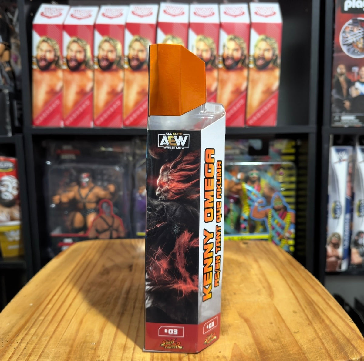 Action figure box side panel with AEW Unrivaled Collection Kenny Omega graphic