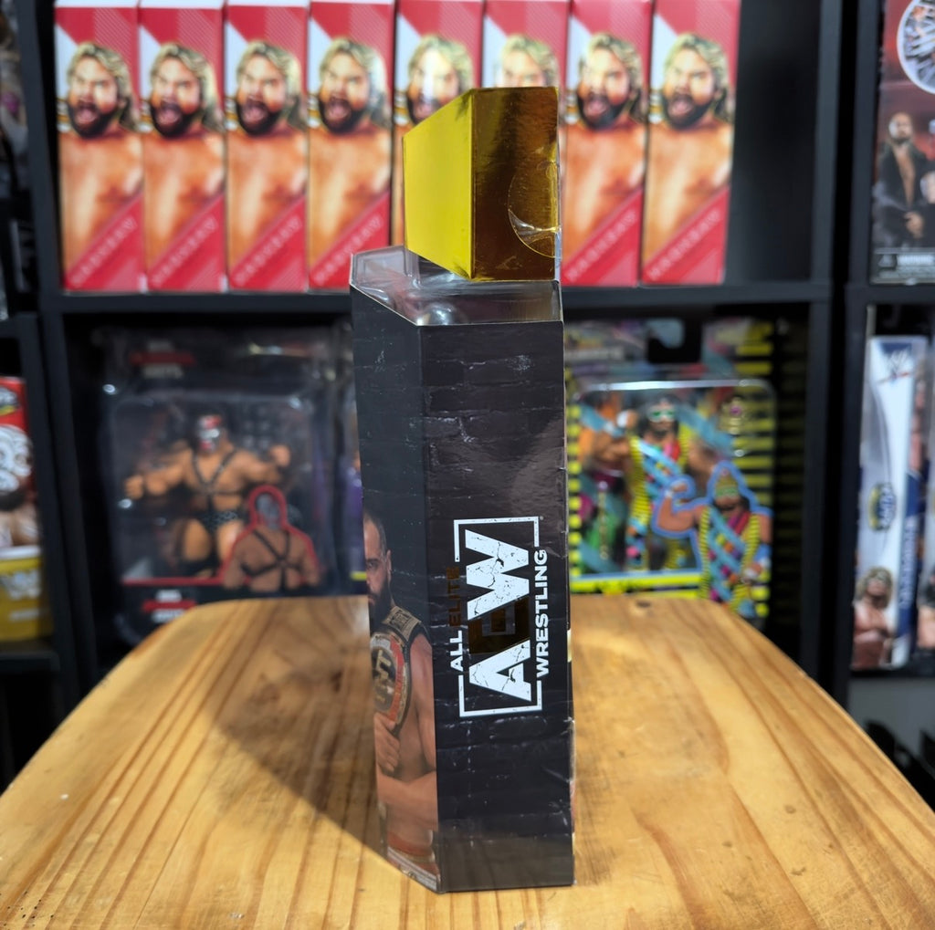Boxed AEW wrestling action figure, gold foil top and Unrivaled Series logo