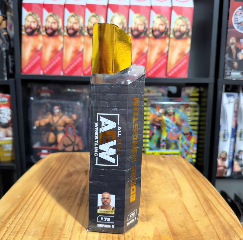 AEW wrestling figure box side with Eddie Kingston branding and gold top