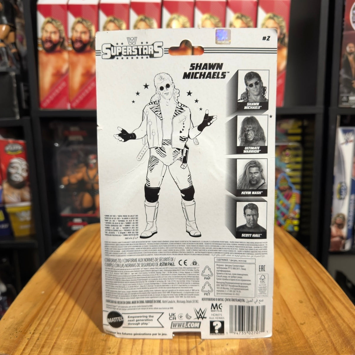 WWE Superstars Shawn Michaels action figure box, back with character info and photos